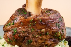 Roasted & glazed in butter and herbs veal knuckle 